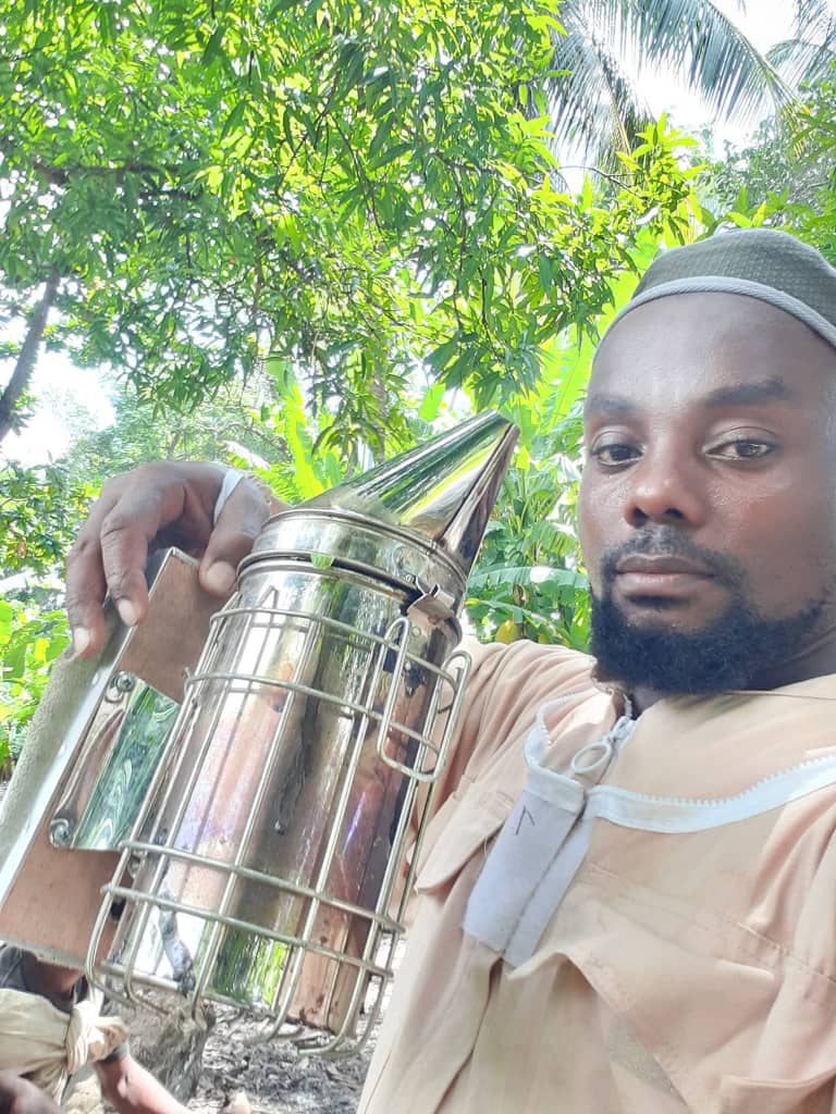 Beekeeper with smoker