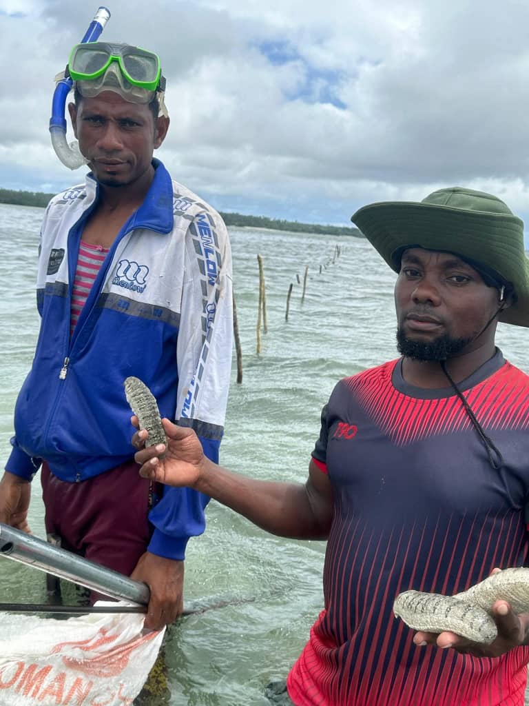 Men with sea cucumbers